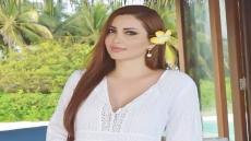 نسرين طافش تتألق بالفوشيا في مهرجان الجونة